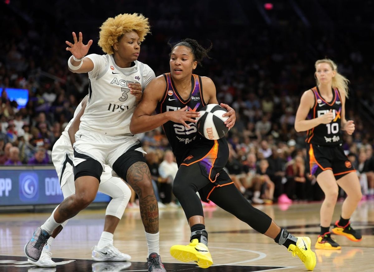 Jun 17, 2026; Phoenix, Arizona, USA; Phoenix Mercury forward Alyssa Thomas (25) drives to the basket against Las Vegas Aces forward NaLyssa Smith (3) in the second half at Mortgage Matchup Center. Mandatory Credit: Mark J. Rebilas-Imagn Images