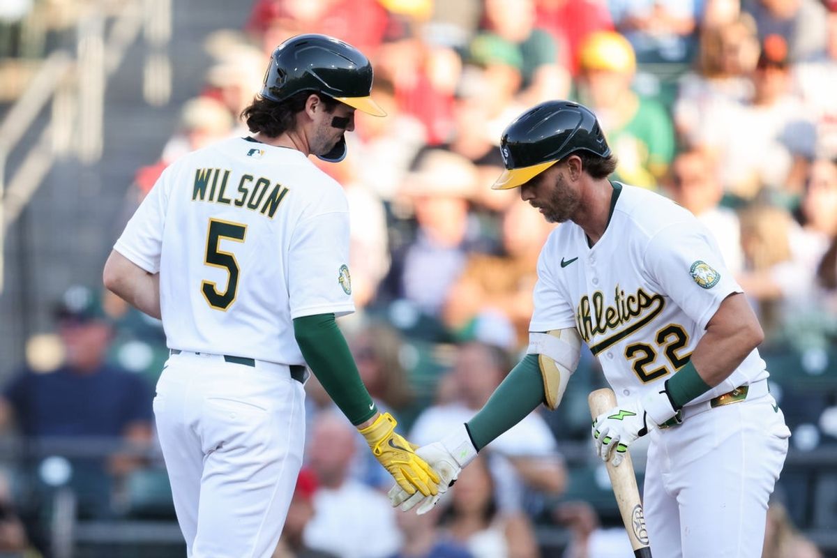 Deadspin | A’s ride momentum of fast start into rematch vs. Angels Jun 18, 2026; West Sacramento, California, USA; Athletics shortstop Jacob Wilson (5) celebrates with second baseman Jeff McNeil (22) after scoring during the first inning against the Los Angeles Angels at Sutter Health Park. Mandatory Credit: Sergio Estrada-Imagn Images The Athletics made quick work of the Los Angeles Angels in the series opener and will search for another early-inning knockout punch Friday night when the teams continue their four-game set at West Sacramento, Calif. The A’s sent 11 batters to the plate in a five-run first inning and never relinquished control in a 5-0 victory that followed a stretch in which the team lost three of four games. Shea Langeliers hit a three-run homer in the first inning Thursday and Tyler Soderstrom followed with a solo shot. The first six batters recorded hits, and the Athletics had seven of their eight overall hits in the opening frame. “Really unusual game from the offensive standout,” A’s manager Mark Kotsay said. “We came out aggressive. Obviously, we put an inning together that is probably one of our better innings this season. Then to be held to one hit the next seven innings is pretty unique.” Langeliers took over the club leadership with 19 homers, one ahead of Nick Kurtz. Zack Gelof of the A’s went 1-for-3 with a walk to extend his career-best hitting streak to 22 games, the longest active streak in the majors. Los Angeles had just four hits while losing for the fourth time in five games. The Angels received a blow prior to the contest when star center fielder Mike Trout went on the 10-day injured list after sustaining a right hamstring strain while running the bases one day earlier against the Arizona Diamondbacks. Trout had played in 74 of 75 games before going on the IL as he displayed better durability than his recent injury-plagued seasons. “He plays the game hard,” Angels manager Kurt Suzuki said. “He sets the example for everybody, and he’s a good role model for the youth out there.” Trout certainly wasn’t pleased with the timing of the injury, but he downplayed any concern about it as the All-Star break nears. The All-Star Game will be July 14 in Philadelphia, located roughly 45 miles from his hometown of Millville, N.J. “I really haven’t thought like that,” said Trout, an 11-time All-Star. “Obviously, I want to play if I get voted in, but no timeline. If I put a timeline on things, I’ve done that in the past, and it’s just frustration whether you do hit it or don’t hit it.” Los Angeles will turn to ace right-hander Jose Soriano (8-4, 2.79 ERA) on Friday for the second contest of the four-game slate. Soriano, 27, received a no-decision against the Athletics on May 21 when he gave up two runs and six hits in 6 2/3 innings of the Angels’ 3-2 loss in 10 innings. He is 1-3 with a 7.82 ERA in nine career appearances (seven starts) against the A’s. Langeliers (7-for-14) and Lawrence Butler (5-for-18) each have two homers off Soriano while Kurtz (3-for-12) has taken him deep once. Soriano pitched five shutout innings of three-hit ball in an 8-0 win over the Tampa Bay Rays last Saturday. He said he was bothered by leg soreness during that outing. Left-hander Jeffrey Springs (3-7, 5.13 ERA) will take the mound for the Athletics on Friday. Springs, 33, has lost seven straight decisions and is winless over 11 starts since last prevailing on April 14 against the Texas Rangers. He has served up 12 homers over his last six starts, including three in Sunday’s 23-9 loss to Colorado. Springs gave up eight runs (six earned) and seven hits over four innings against the Rockies. Springs is 2-3 with a 5.23 ERA in 13 career appearances (four starts) against the Angels. Jo Adell is 3-for-9 with two homers and five strikeouts against him, while Nolan Schanuel is 3-for-5. –Field Level Media #Deadspin #ride #momentum #fast #start #rematch #Angels Deadspin | A’s ride momentum of fast start into rematch vs. Angels Jun 18, 2026; West Sacramento, California, USA; Athletics shortstop Jacob Wilson (5) celebrates with second baseman Jeff McNeil (22) after scoring during the first inning against the Los Angeles Angels at Sutter Health Park. Mandatory Credit: Sergio Estrada-Imagn Images The Athletics made quick work of the Los Angeles Angels in the series opener and will search for another early-inning knockout punch Friday night when the teams continue their four-game set at West Sacramento, Calif. The A’s sent 11 batters to the plate in a five-run first inning and never relinquished control in a 5-0 victory that followed a stretch in which the team lost three of four games. Shea Langeliers hit a three-run homer in the first inning Thursday and Tyler Soderstrom followed with a solo shot. The first six batters recorded hits, and the Athletics had seven of their eight overall hits in the opening frame. “Really unusual game from the offensive standout,” A’s manager Mark Kotsay said. “We came out aggressive. Obviously, we put an inning together that is probably one of our better innings this season. Then to be held to one hit the next seven innings is pretty unique.” Langeliers took over the club leadership with 19 homers, one ahead of Nick Kurtz. Zack Gelof of the A’s went 1-for-3 with a walk to extend his career-best hitting streak to 22 games, the longest active streak in the majors. Los Angeles had just four hits while losing for the fourth time in five games. The Angels received a blow prior to the contest when star center fielder Mike Trout went on the 10-day injured list after sustaining a right hamstring strain while running the bases one day earlier against the Arizona Diamondbacks. Trout had played in 74 of 75 games before going on the IL as he displayed better durability than his recent injury-plagued seasons. “He plays the game hard,” Angels manager Kurt Suzuki said. “He sets the example for everybody, and he’s a good role model for the youth out there.” Trout certainly wasn’t pleased with the timing of the injury, but he downplayed any concern about it as the All-Star break nears. The All-Star Game will be July 14 in Philadelphia, located roughly 45 miles from his hometown of Millville, N.J. “I really haven’t thought like that,” said Trout, an 11-time All-Star. “Obviously, I want to play if I get voted in, but no timeline. If I put a timeline on things, I’ve done that in the past, and it’s just frustration whether you do hit it or don’t hit it.” Los Angeles will turn to ace right-hander Jose Soriano (8-4, 2.79 ERA) on Friday for the second contest of the four-game slate. Soriano, 27, received a no-decision against the Athletics on May 21 when he gave up two runs and six hits in 6 2/3 innings of the Angels’ 3-2 loss in 10 innings. He is 1-3 with a 7.82 ERA in nine career appearances (seven starts) against the A’s. Langeliers (7-for-14) and Lawrence Butler (5-for-18) each have two homers off Soriano while Kurtz (3-for-12) has taken him deep once. Soriano pitched five shutout innings of three-hit ball in an 8-0 win over the Tampa Bay Rays last Saturday. He said he was bothered by leg soreness during that outing. Left-hander Jeffrey Springs (3-7, 5.13 ERA) will take the mound for the Athletics on Friday. Springs, 33, has lost seven straight decisions and is winless over 11 starts since last prevailing on April 14 against the Texas Rangers. He has served up 12 homers over his last six starts, including three in Sunday’s 23-9 loss to Colorado. Springs gave up eight runs (six earned) and seven hits over four innings against the Rockies. Springs is 2-3 with a 5.23 ERA in 13 career appearances (four starts) against the Angels. Jo Adell is 3-for-9 with two homers and five strikeouts against him, while Nolan Schanuel is 3-for-5. –Field Level Media #Deadspin #ride #momentum #fast #start #rematch #Angels