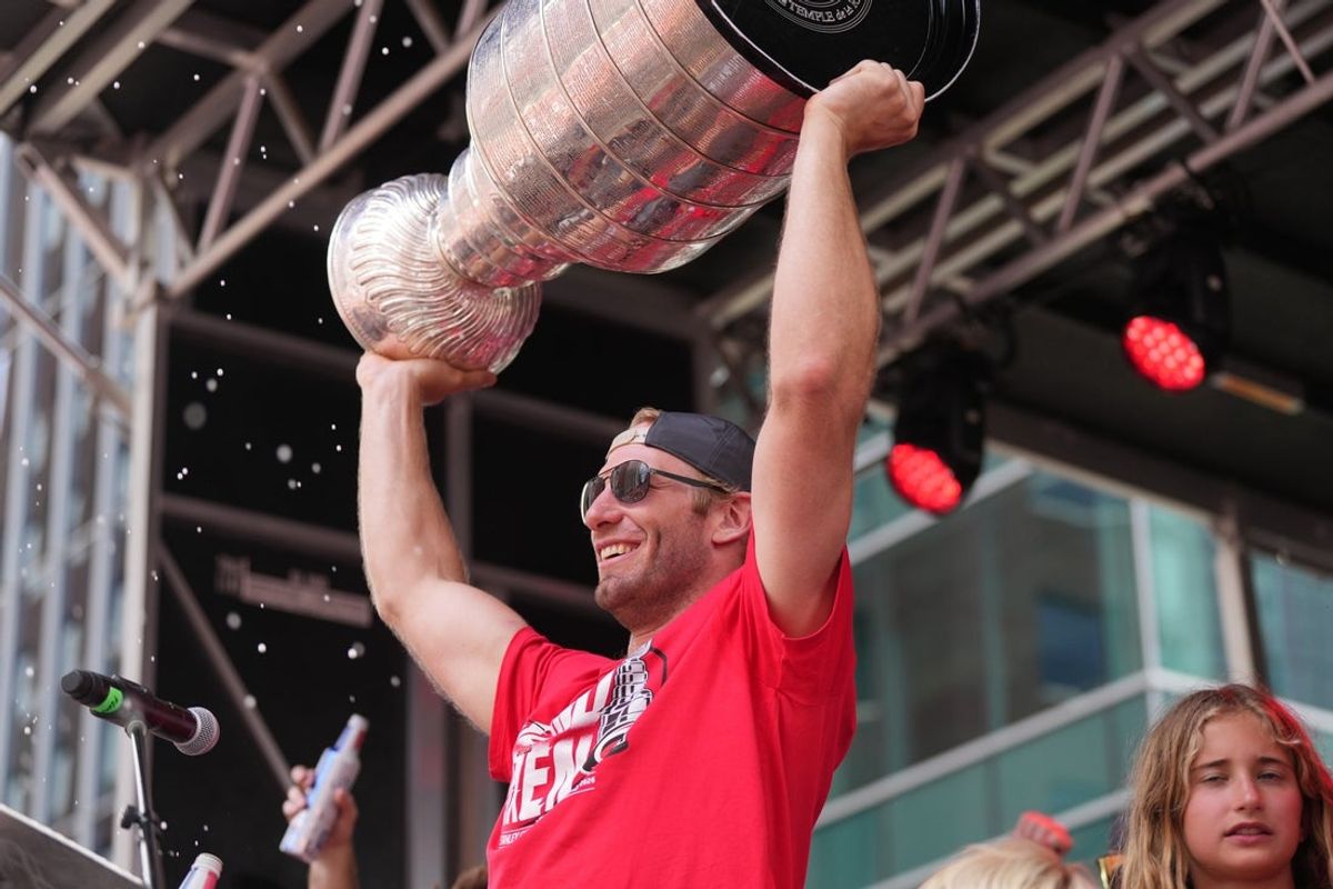Jun 20, 2026; Raleigh, North Carolina, USA; Carolina Hurricanes center Jordan Staal (11) holds up the Stanley Cup Trophy during the Stanley Cup championship parade and rally at Raleigh. Mandatory Credit: James Guillory-Imagn Images