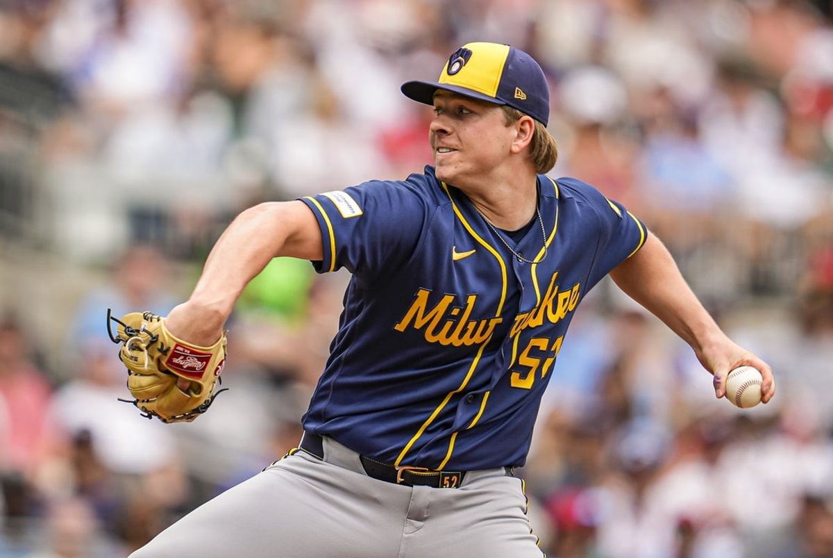 Jun 20, 2026; Cumberland, Georgia, USA; Milwaukee Brewers pitcher Kyle Harrison (52) pitches against the Atlanta Braves during the first inning at Truist Park. Mandatory Credit: Dale Zanine-Imagn Images