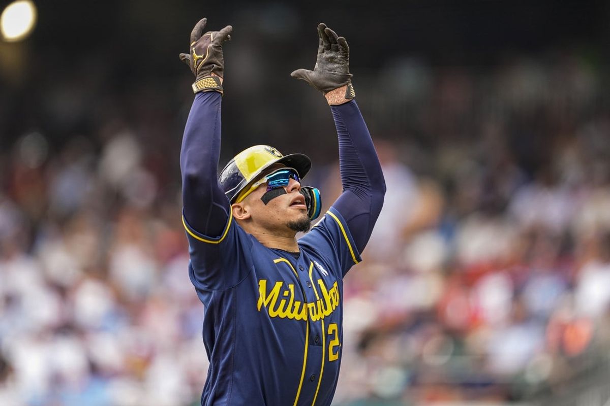 21 de junho de 2026; Cumberland, Geórgia, EUA; O apanhador do Milwaukee Brewers, William Contreras (24), reage após acertar um home run de três corridas contra o Atlanta Braves durante o segundo turno em Truist Park. Crédito obrigatório: Dale Zanine-Imagn Images