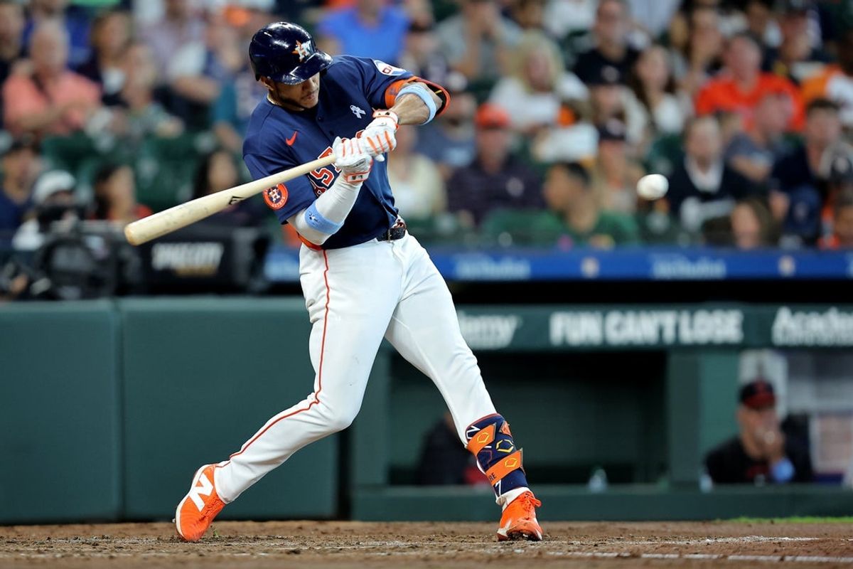 Jun 21, 2026; Houston, Texas, USA; Houston Astros shortstop Jeremy Pena (3) hits a double  against the Cleveland Guardians during the fifth inning at Daikin Park. Mandatory Credit: Erik Williams-Imagn Images