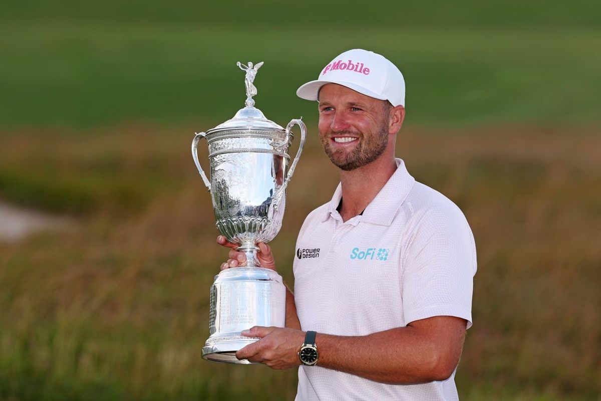 Jun 21, 2026; Southampton, New York, USA; Wyndham Clark celebrates after the win during final round of the U.S. Open golf tournament at Shinnecock Hills Golf Club. Mandatory Credit: Bill Streicher-Imagn Images