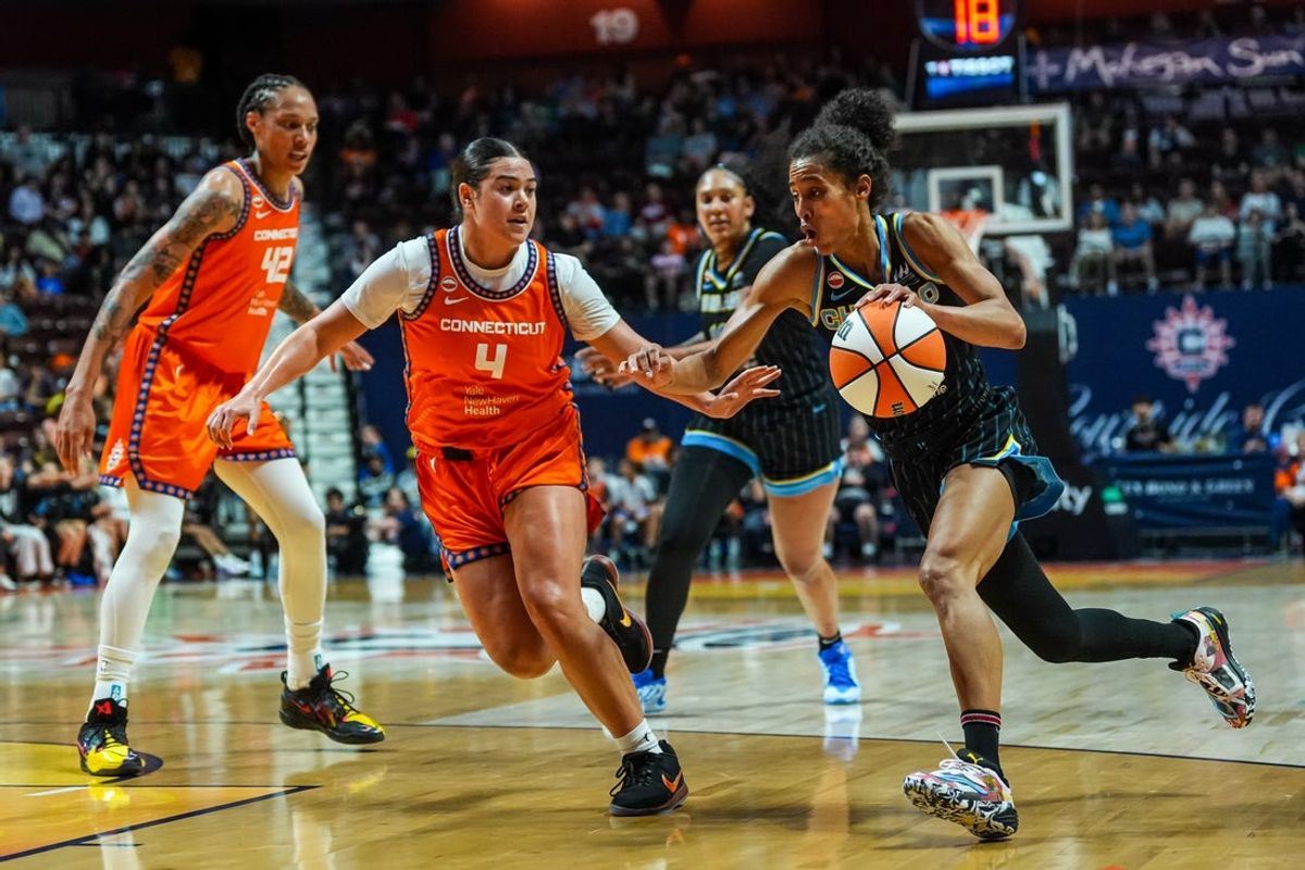 Jun 22, 2026; Uncasville, Connecticut, USA; Chicago Sky guard Skylar Diggins (4) drives the ball against Connecticut Sun guard Charlisse Leger-Walker (4) in the first half at Mohegan Sun Arena. Mandatory Credit: David Butler II-Imagn Images