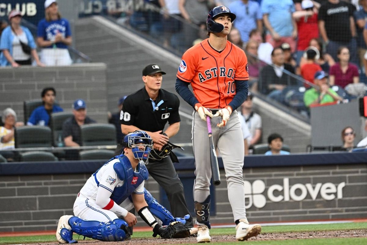 Jun 23, 2026; Toronto, Ontario, CAN;  Houston Astros left fielder Joey Loperfido (10) watches the flight of the ball after hitting a three run home run against the Toronto Blue Jays in the 11th inning at Rogers Centre. Mandatory Credit: Dan Hamilton-Imagn Images