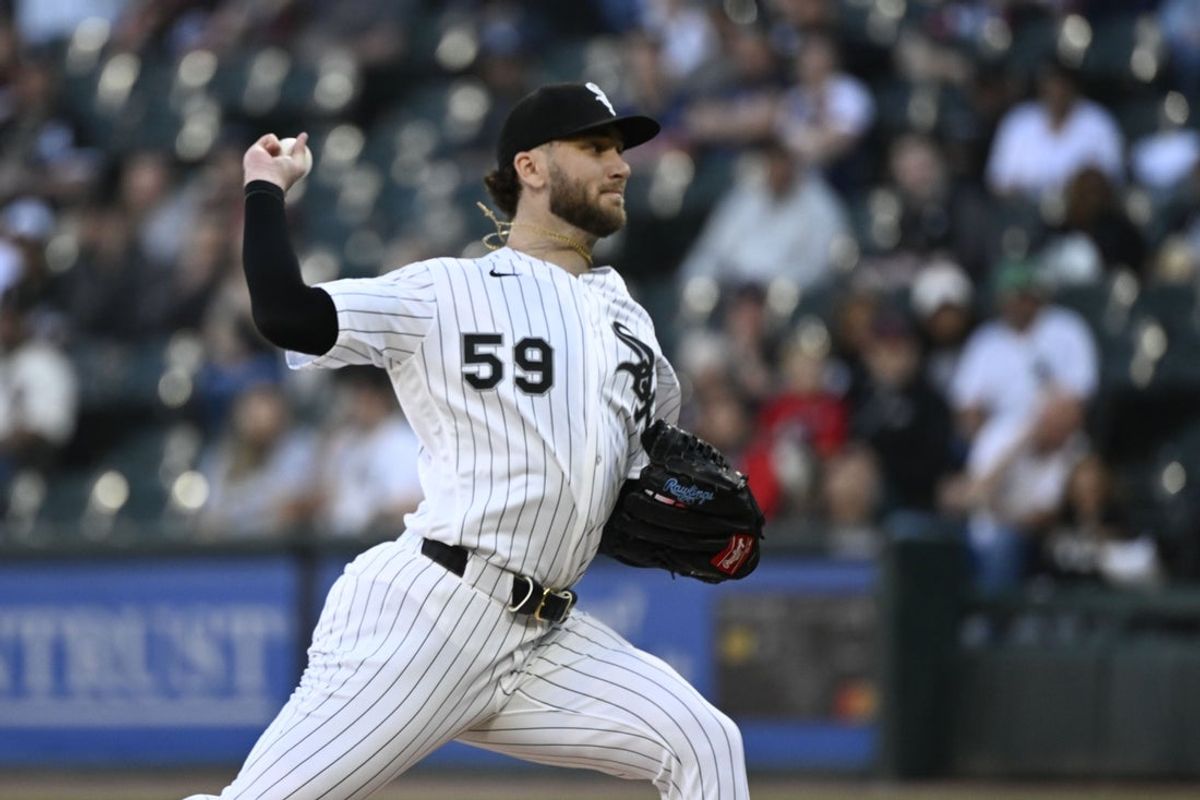 Jun 23, 2026; Chicago, Illinois, USA;  Chicago White Sox pitcher Sean Burke (59) delivers the ball during the first inning against the Cleveland Guardians at Rate Field. Mandatory Credit: Matt Marton-Imagn Images