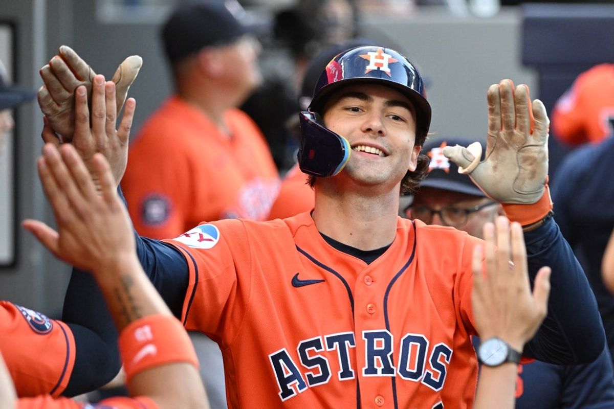 Jun 23, 2026; Toronto, Ontario, CAN;  Houston Astros left fielder Joey Loperfido (10) celebrates in the dugout with team mates after hitting a three run home run against the Toronto Blue Jays in the 11th inning at Rogers Centre. Mandatory Credit: Dan Hamilton-Imagn Images
