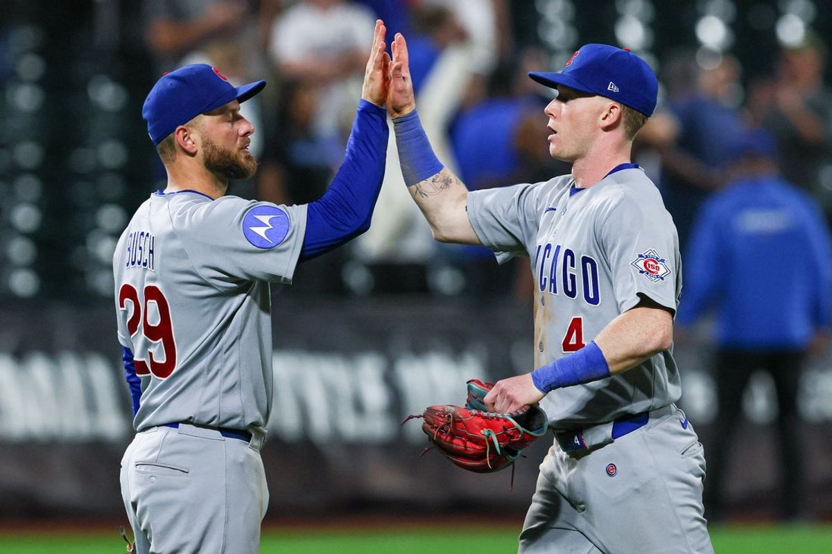 Jun 23, 2026; New York City, New York, USA; Chicago Cubs first baseman Michael Busch (29) celebrates with center fielder Pete Crow-Armstrong (4) after defeating the New York Mets at Citi Field. Mandatory Credit: Vincent Carchietta-Imagn Images