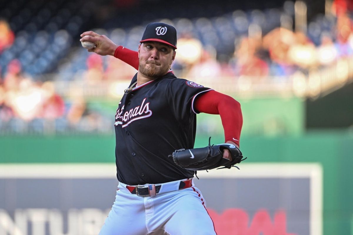 Jun 25, 2026; Washington, District of Columbia, USA; Washington Nationals pitcher Cade Cavalli (24) throws to the Philadelphia Phillies during the first inning at Nationals Park. Mandatory Credit: Brad Mills-Imagn Images