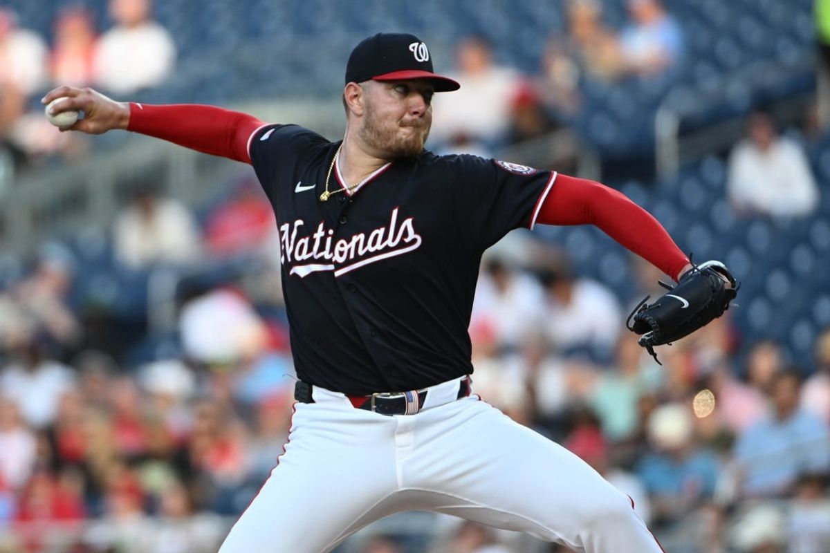 Jun 25, 2026; Washington, District of Columbia, USA; Washington Nationals pitcher Cade Cavalli (24) throws to the Philadelphia Phillies during the second inning at Nationals Park. Mandatory Credit: Brad Mills-Imagn Images