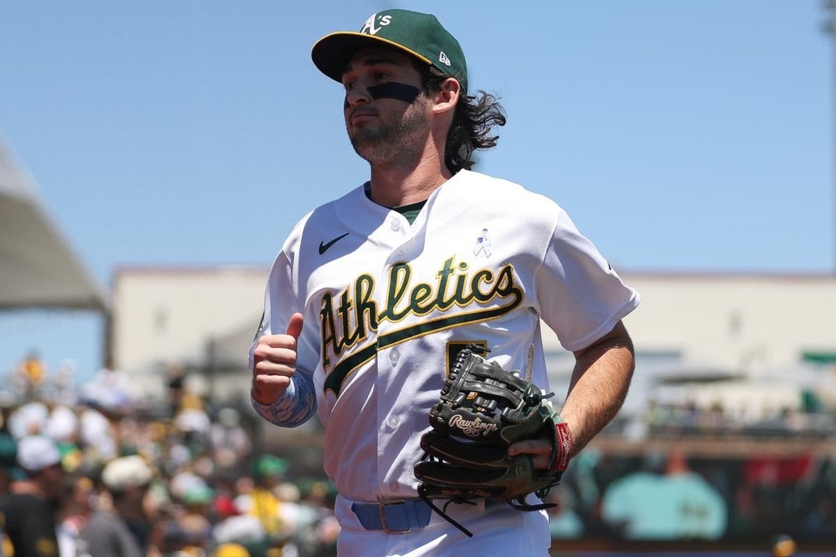 Jun 21, 2026; West Sacramento, California, USA; Athletics shortstop Jacob Wilson (5) walks to the dugout before a baseball game against the Los Angeles Angels at Sutter Health Park. Mandatory Credit: Scott Marshall-Imagn Images