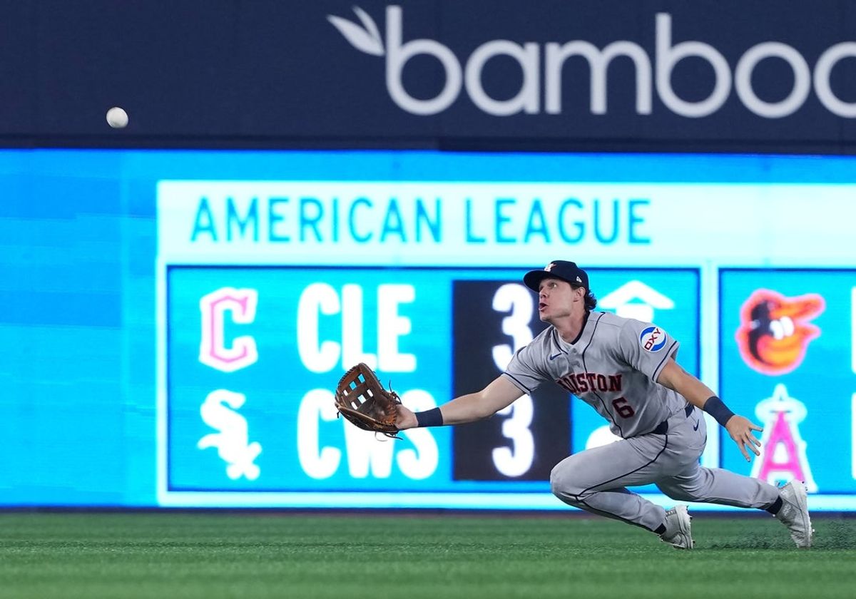 Jun 22, 2026; Toronto, Ontario, CAN; Houston Astros center fielder Jake Meyers (6) tries to catch a fly ball against the Toronto Blue Jays during the eighth inning at Rogers Centre. Mandatory Credit: Nick Turchiaro-Imagn Images