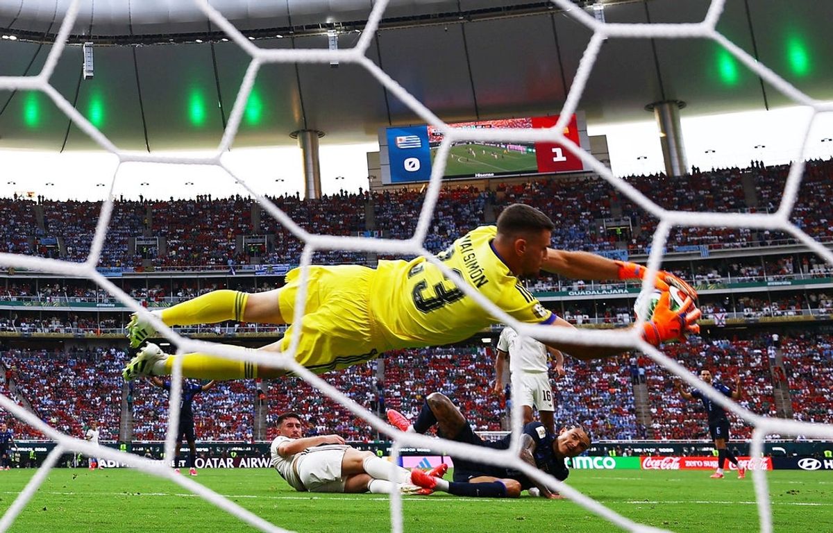 June 26, 2026; Guadalajara, Mexico; Spain's Unai Simon makes a save from Uruguay's Darwin Nunez.  Mandatory Credit: Daniel Becerril-Reuters via Imagn Images