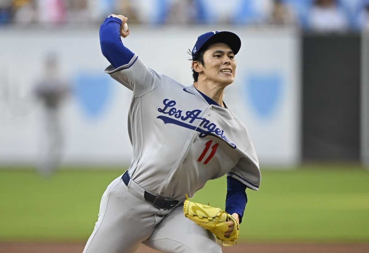 Jun 26, 2026; San Diego, California, USA; Los Angeles Dodgers pitcher Roki Sasaki (11) delivers during the second inning against the San Diego Padres at Petco Park. Mandatory Credit: Denis Poroy-Imagn Images