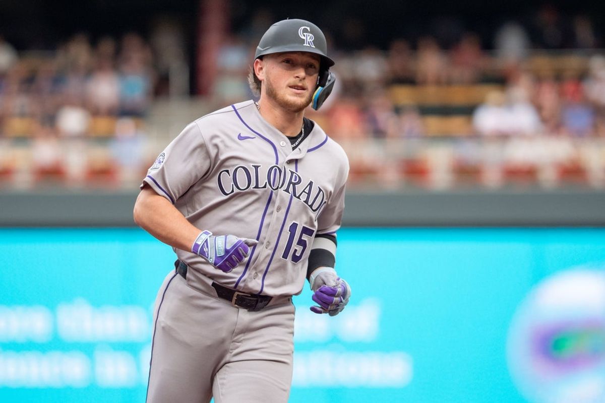 Jun 27, 2026; Minneapolis, Minnesota, USA; Colorado Rockies designated hitter Hunter Goodman (15) hits a home run off a pitch from Minnesota Twins starting pitcher Mike Paredes (53) in the first inning at Target Field. Mandatory Credit: Matt Blewett-Imagn Images
