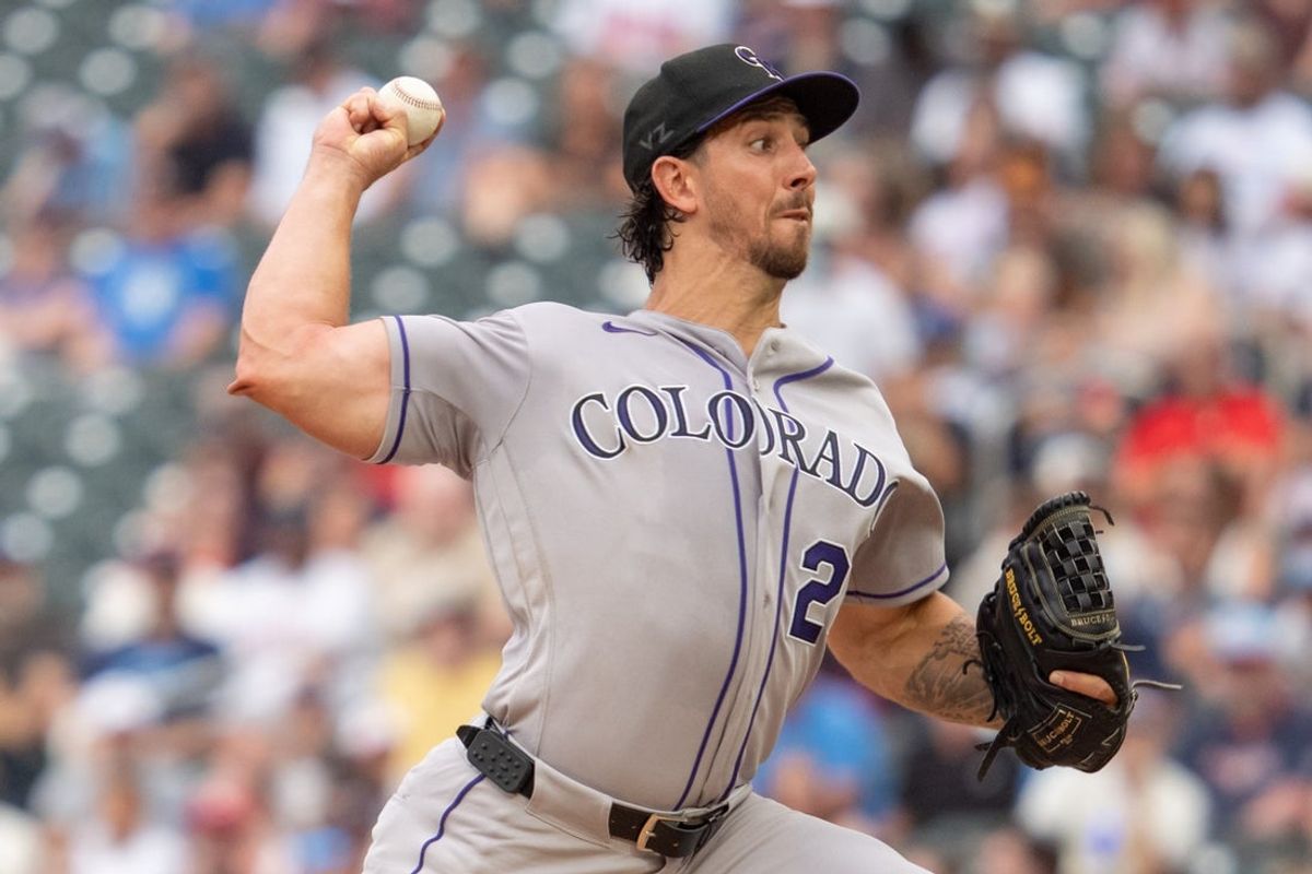 Jun 27, 2026; Minneapolis, Minnesota, USA; Colorado Rockies starting pitcher Michael Lorenzen (24) delivers a pitch to Minnesota Twins third baseman Brooks Lee (22) in the second inning at Target Field. Mandatory Credit: Matt Blewett-Imagn Images