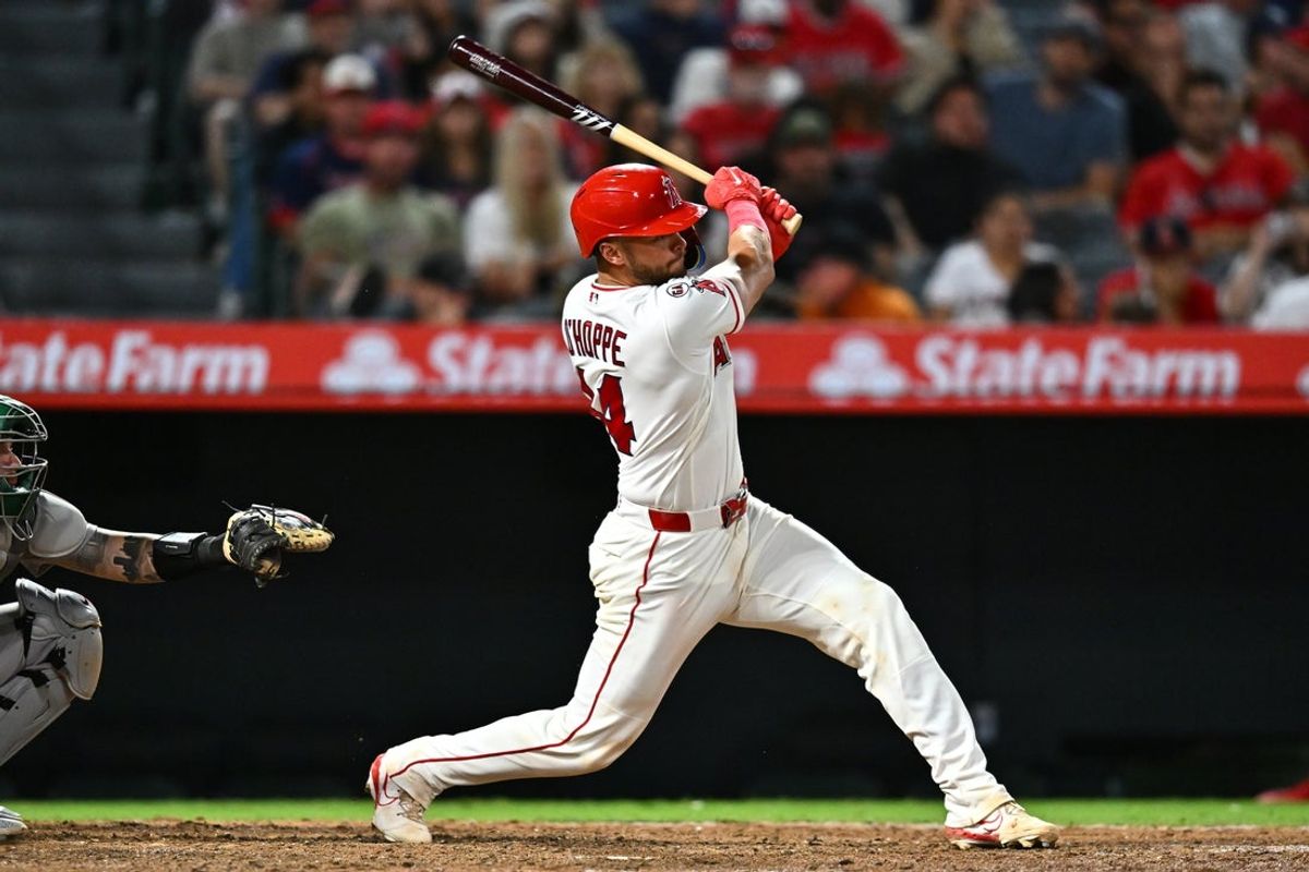 Jun 27, 2026; Anaheim, California, USA; Los Angeles Angels catcher Logan O'Hoppe (14) hits an RBI single during the eighth inning against the Athletics at Angel Stadium. Mandatory Credit: William Liang-Imagn Images
