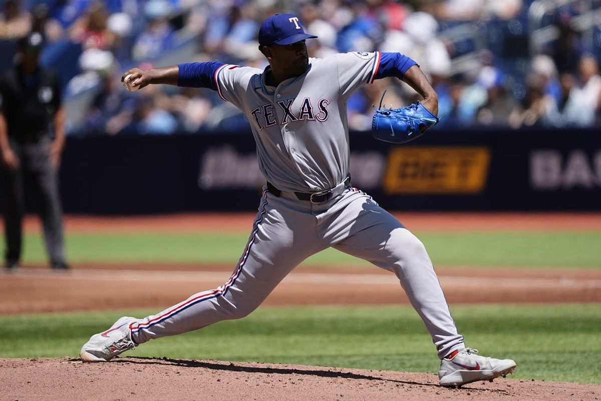 Jun 28, 2026; Toronto, Ontario, CAN; Texas Rangers starting pitcher Kumar Rocker (80) pitches to the Toronto Blue Jays during the first inning at Rogers Centre. Mandatory Credit: John E. Sokolowski-Imagn Images