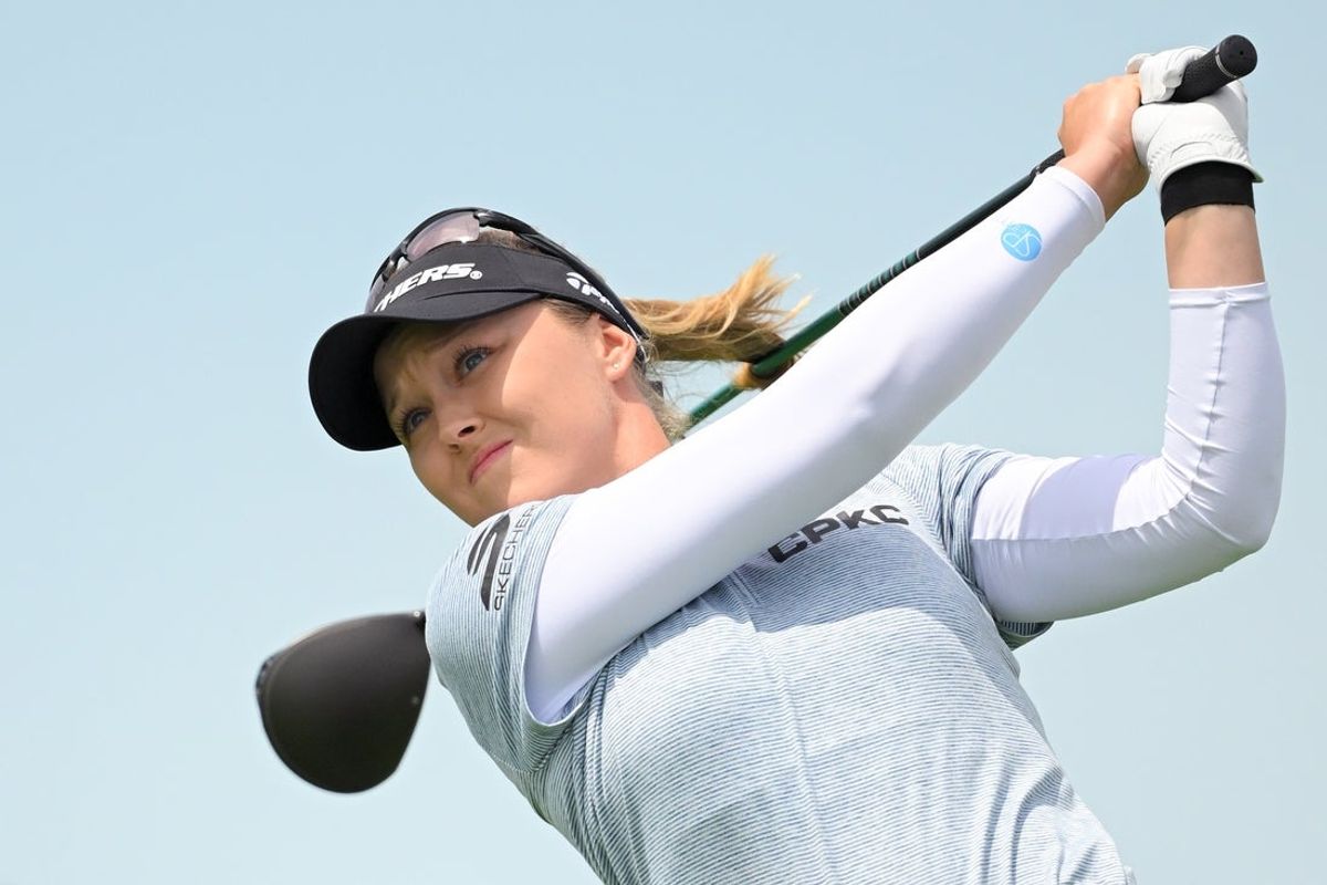 Jun 28, 2026; Chaska, Minnesota, USA; Brooke Henderson takes a tee shot off of hole 1 during the final round of the KPMG Women's PGA Championship golf tournament. Mandatory Credit: Nick Wosika-Imagn Images