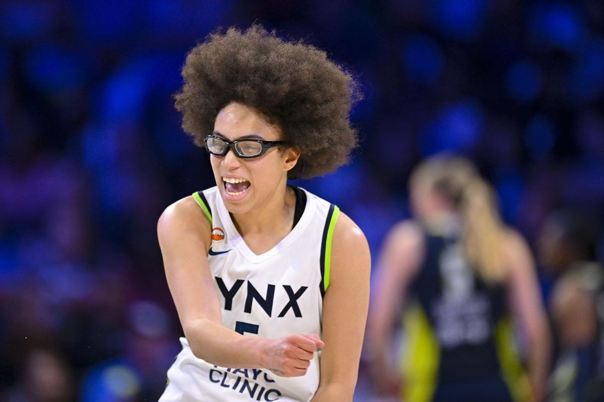 Jun 28, 2026; Arlington, Texas, USA; Minnesota Lynx guard Olivia Miles (5) celebrates during the second half against the Dallas Wings at College Park Center. Mandatory Credit: Jerome Miron-Imagn Images