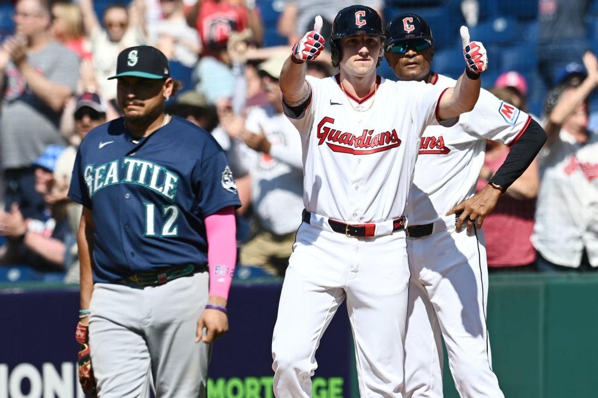 Jun 28, 2026; Cleveland, Ohio, USA; Cleveland Guardians designated hitter Chase DeLauter (24) celebrates after hitting an RBI double during the eighth inning against the Seattle Mariners at Progressive Field. Mandatory Credit: Ken Blaze-Imagn Images