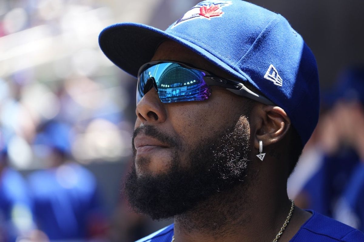 Jun 28, 2026; Toronto, Ontario, CAN; Toronto Blue Jays first baseman Vladimir Guerrero Jr. (27) looks towards the field before the start of the game against the Texas Rangers at Rogers Centre. Mandatory Credit: John E. Sokolowski-Imagn Images