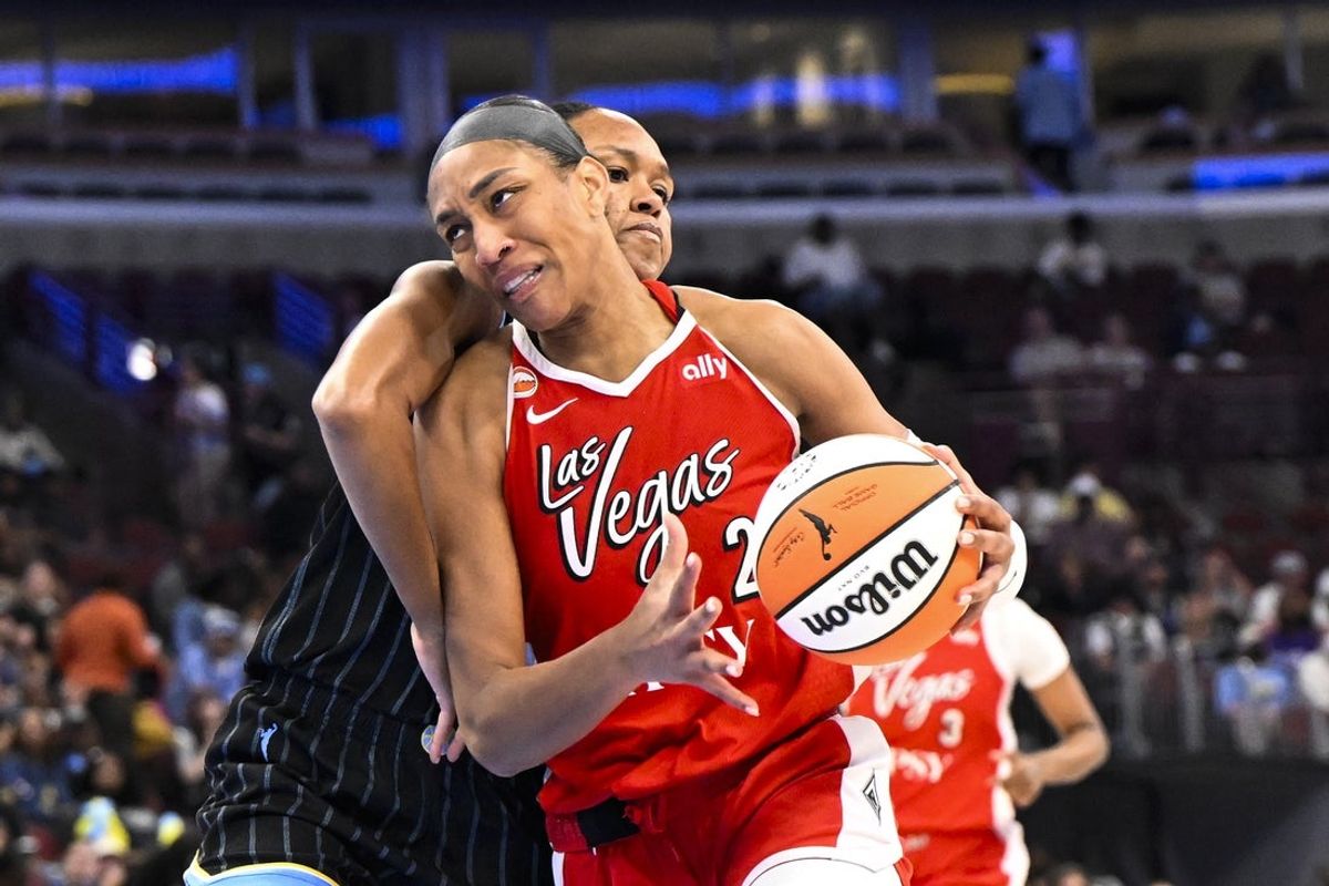 Jun 28, 2026; Chicago, Illinois, USA;  Las Vegas Aces center A'ja Wilson (22) drives to the basket against Chicago Sky forward-center  Azura Stevens (30) during the second half at United Center. Mandatory Credit: Matt Marton-Imagn Images