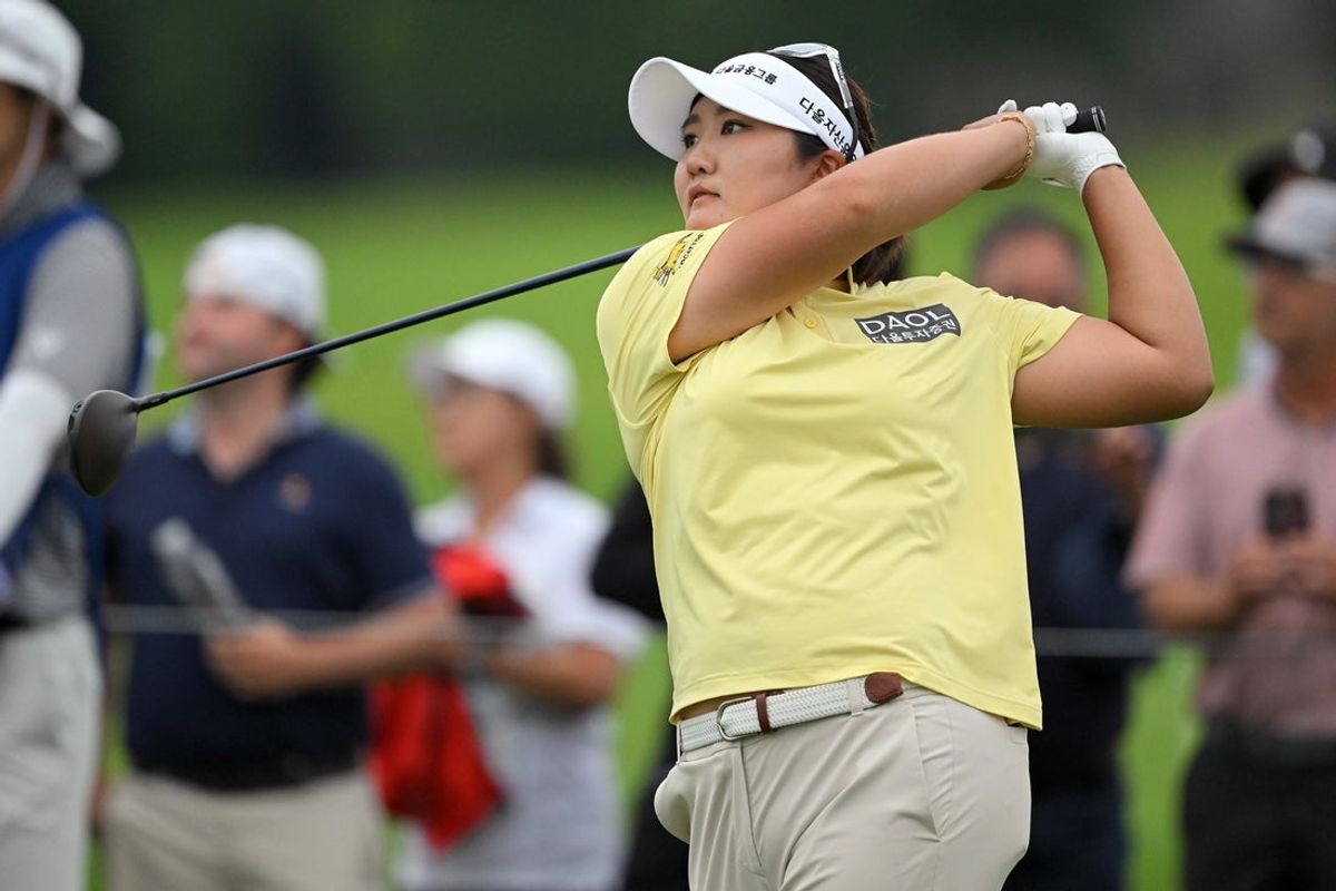 Jun 28, 2026; Chaska, Minnesota, USA; Haeran Ryu hits a tee shot on the 18th hole in the final round of the KPMG Women's PGA Championship golf tournament. Mandatory Credit: Nick Wosika-Imagn Images