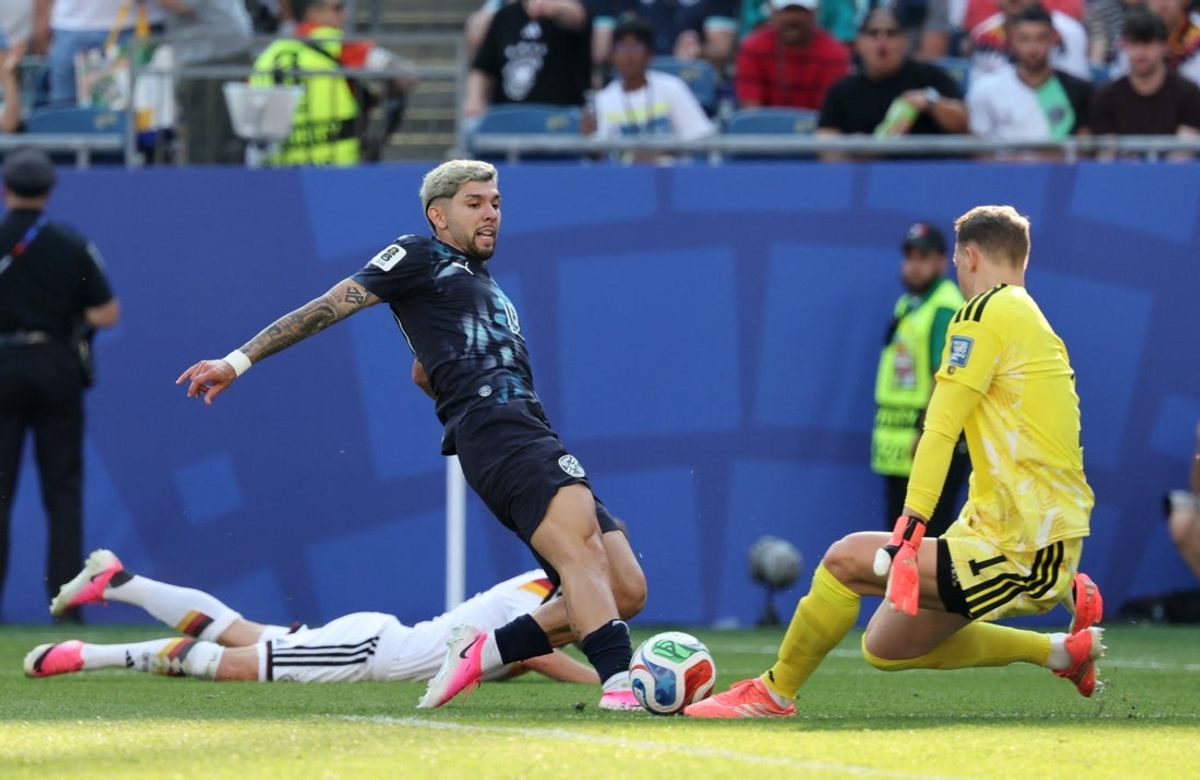 June 29, 2026; Foxborough, Massachusetts, U.S.; Germany's Manuel Neuer in action with Paraguay's Julio Enciso.  Mandatory Credit: Paul Rutherford-Imagn Images