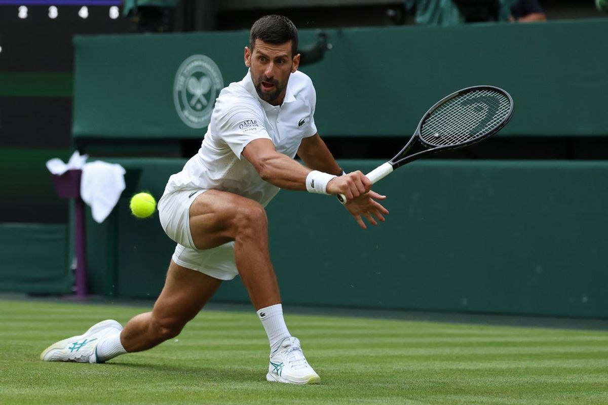 Jun 29, 2026; London, United Kingdom; Novak Djokovic (SRB) reaches for a backhand against Yibing Wu (CHN) (not pictured) on day one of The Championships Wimbledon 2026  at All England Lawn Tennis and Croquet Club. Mandatory Credit: Geoff Burke-Imagn Images