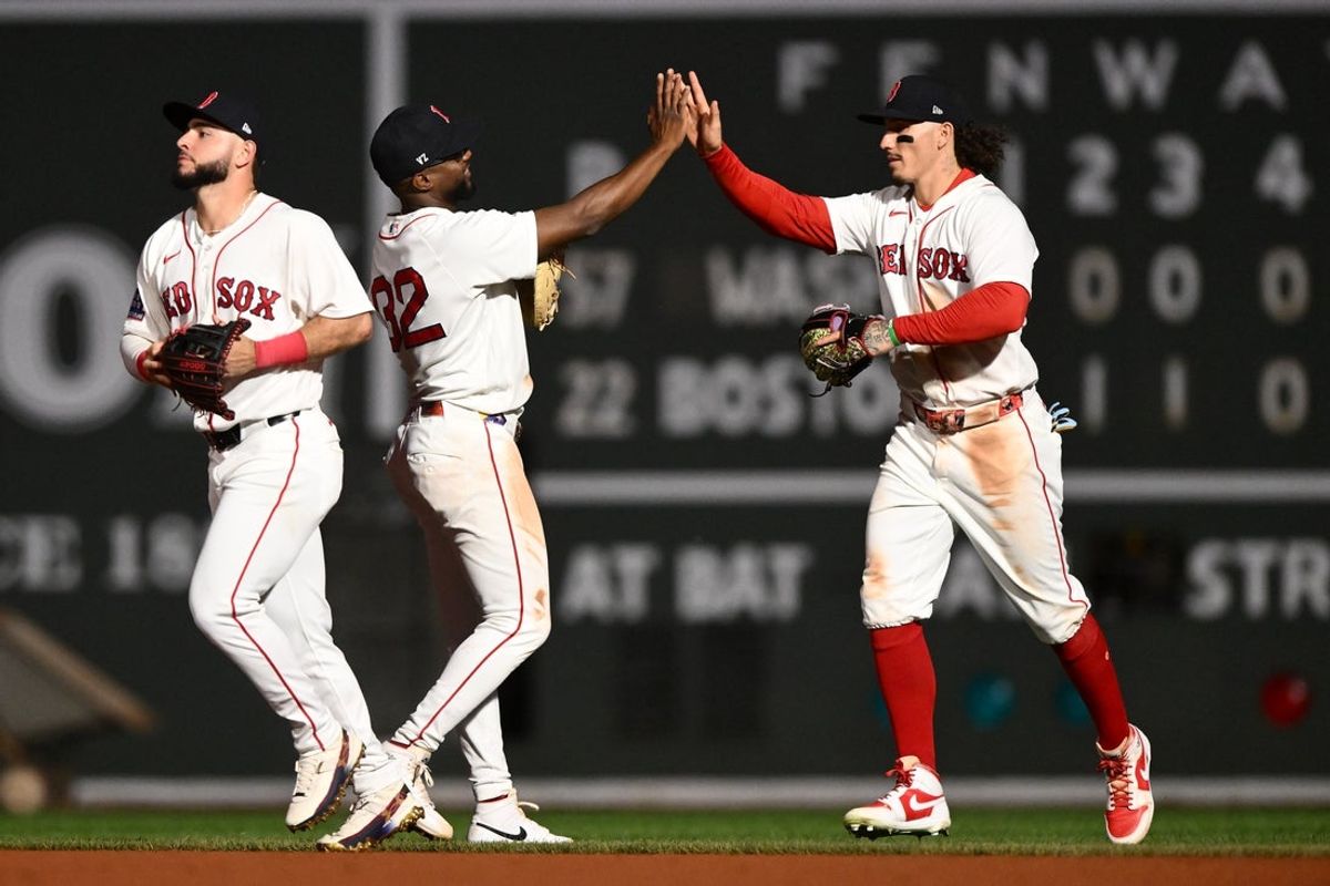 Jun 29, 2026; Boston, Massachusetts, USA; Boston Red Sox left fielder Jarren Duran (16) high-fives shortstop Andruw Monasterio (32) after a game against the Washington Nationals at Fenway Park. Mandatory Credit: Brian Fluharty-Imagn Images