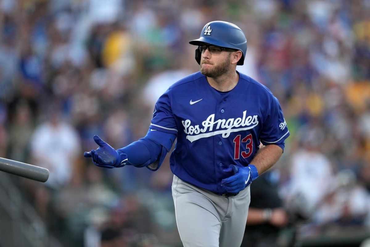 Jun 29, 2026; West Sacramento, California, USA; Los Angeles Dodgers third baseman Max Muncy (13) tosses his bat after hitting a home run against the Athletics in the fourth inning at Sutter Health Park. Mandatory Credit: Cary Edmondson-Imagn Images