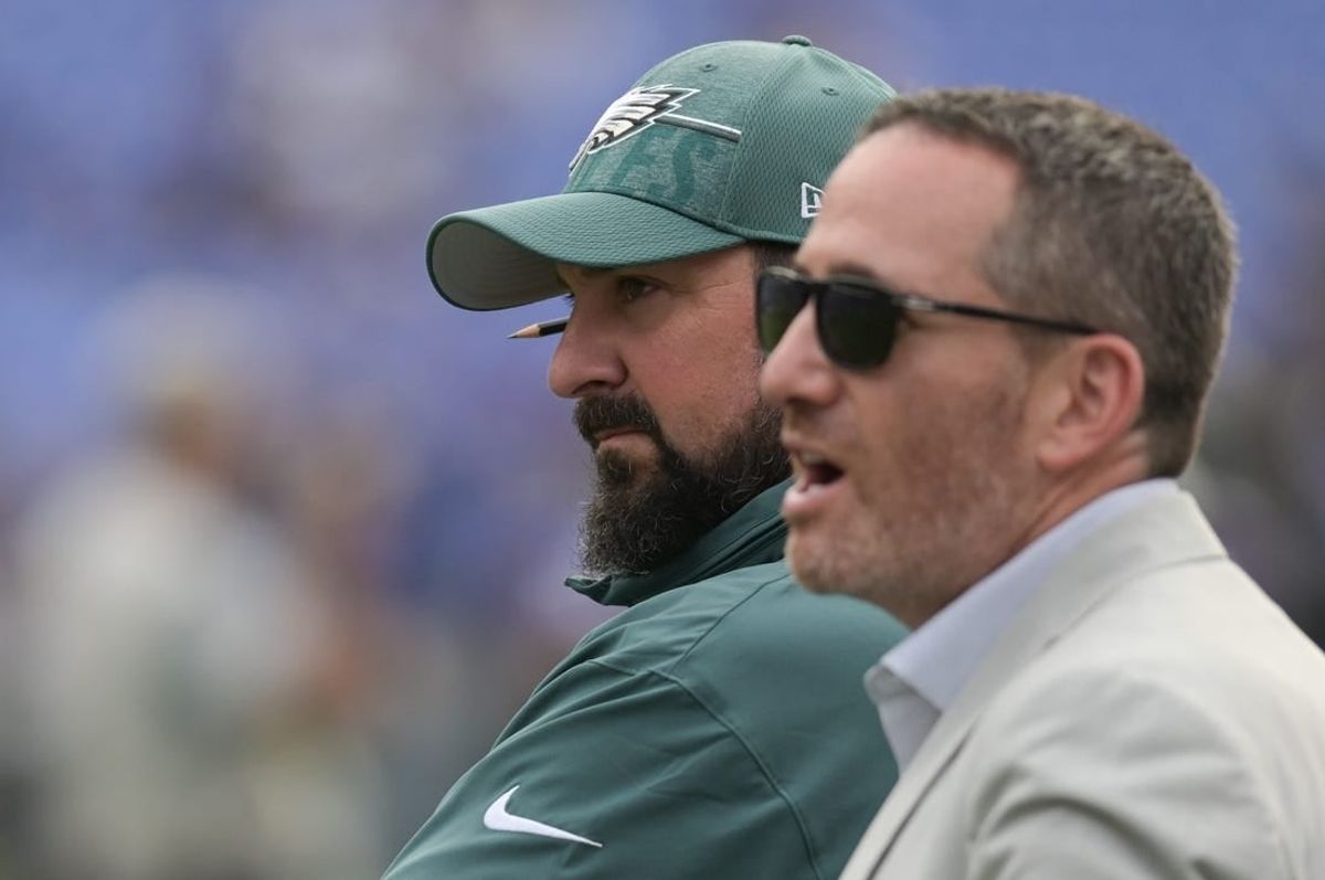 Aug 12, 2023; Baltimore, Maryland, USA;  Philadelphia Eagles assistant coach Matt Patricia stands with  general manager Howie Roseman before the game against the Baltimore Ravens  at M&T Bank Stadium.