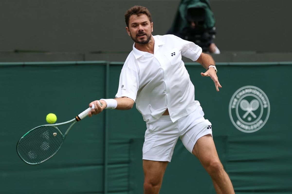 Jun 30, 2026; London, United Kingdom; Stan Wawrinka (SUI) hits a forehand against Matteo Berrettini (ITA) (not pictured) on day two of The Championships Wimbledon 2026 at All England Lawn Tennis and Croquet Club. Mandatory Credit: Geoff Burke-Imagn Images