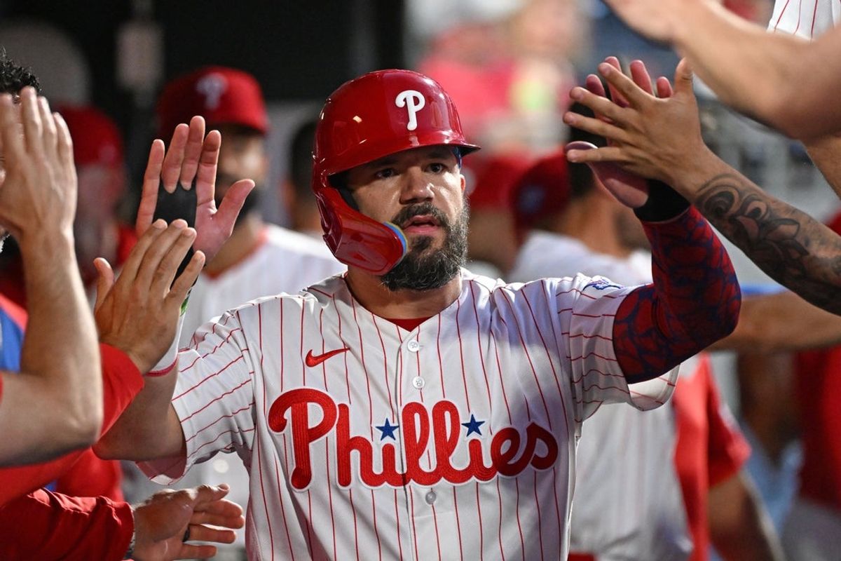 Jun 30, 2026; Philadelphia, Pennsylvania, USA; Philadelphia Phillies designated hitter Kyle Schwarber (12) celebrates in the dugout after scoring a run during the seventh inning against the Pittsburgh Pirates at Citizens Bank Park. Mandatory Credit: Eric Hartline-Imagn Images