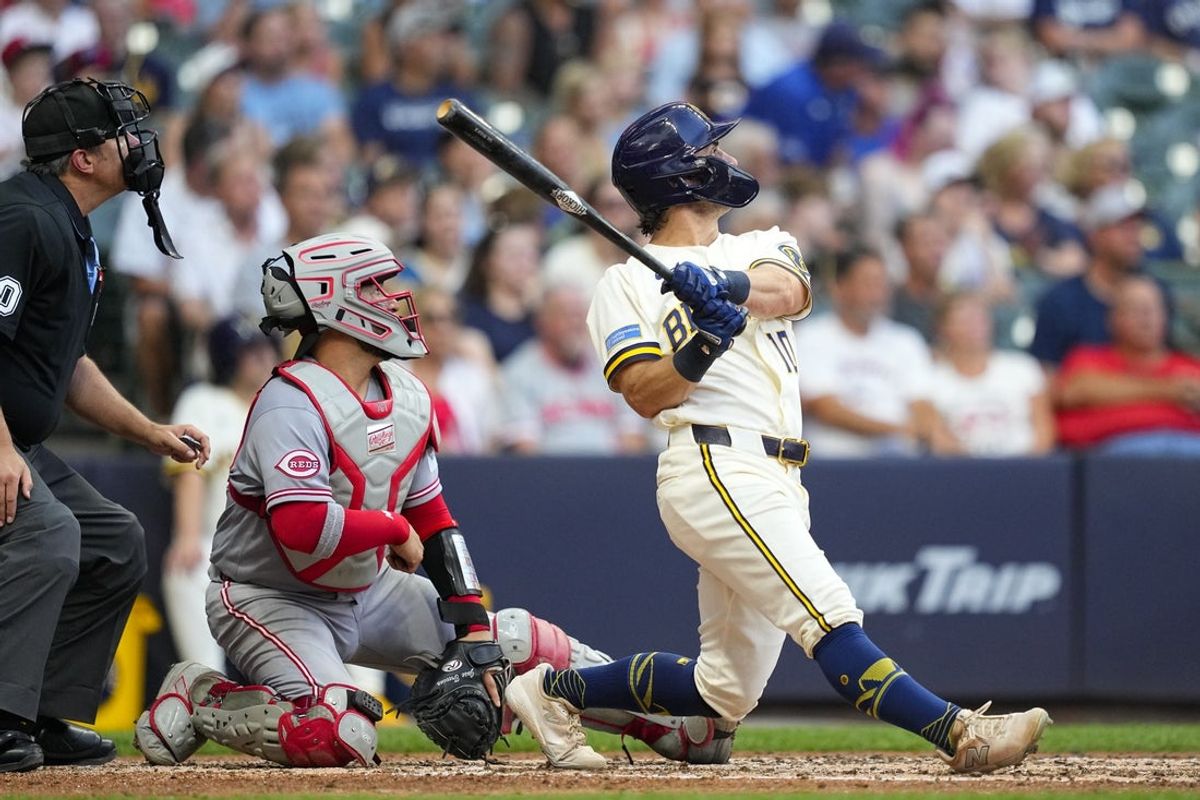 Jun 30, 2026; Milwaukee, Wisconsin, USA;  Milwaukee Brewers right fielder Sal Frelick (10) hits an RBI single during the fourth inning against the Cincinnati Reds at American Family Field. Mandatory Credit: Jeff Hanisch-Imagn Images
