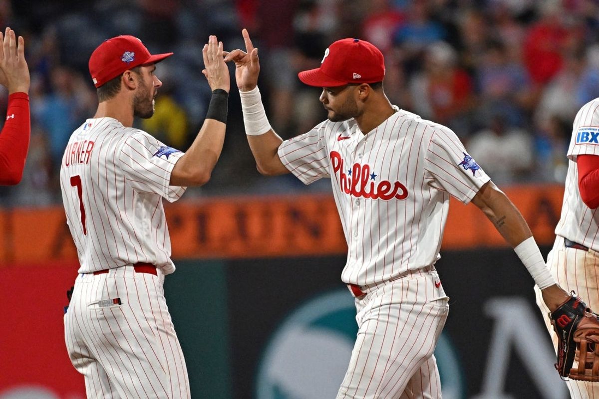 Jun 30, 2026; Philadelphia, Pennsylvania, USA; Philadelphia Phillies shortstop Trea Turner (7) and center fielder Justin Crawford (2) celebrate win against the Pittsburgh Pirates at Citizens Bank Park. Mandatory Credit: Eric Hartline-Imagn Images