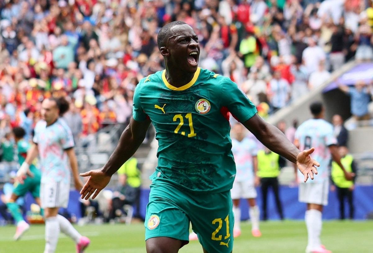 Senegal's Habib Diarra celebrates scoring their first goal against Belgium on July 1.