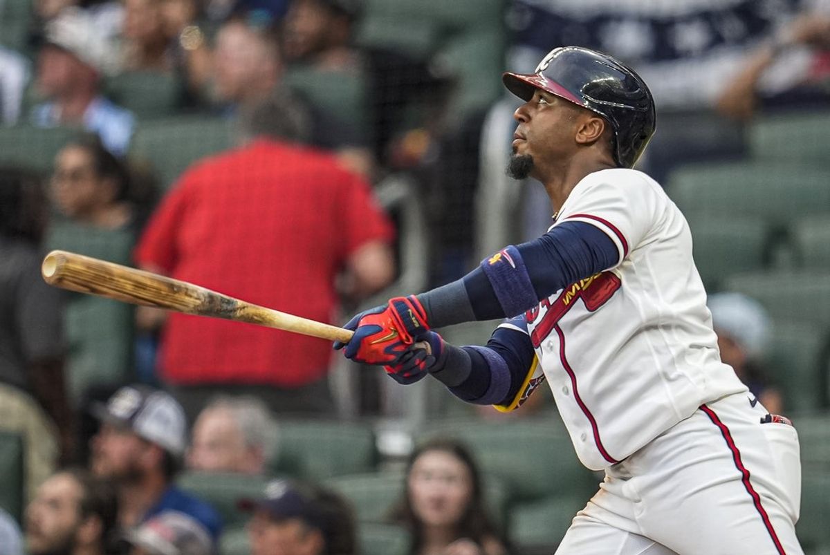Jul 1, 2026; Cumberland, Georgia, USA; Atlanta Braves second baseman Ozzie Albies (1) hits a home run against the St. Louis Cardinals during the third inning at Truist Park. Mandatory Credit: Dale Zanine-Imagn Images
