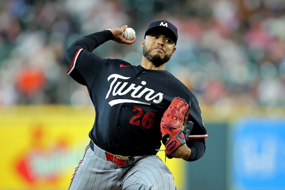 Jul 1, 2026; Houston, Texas, USA; Minnesota Twins pitcher Taj Bradley (26) delivers a pitch against the Houston Astros during the first inning at Daikin Park. Mandatory Credit: Erik Williams-Imagn Images