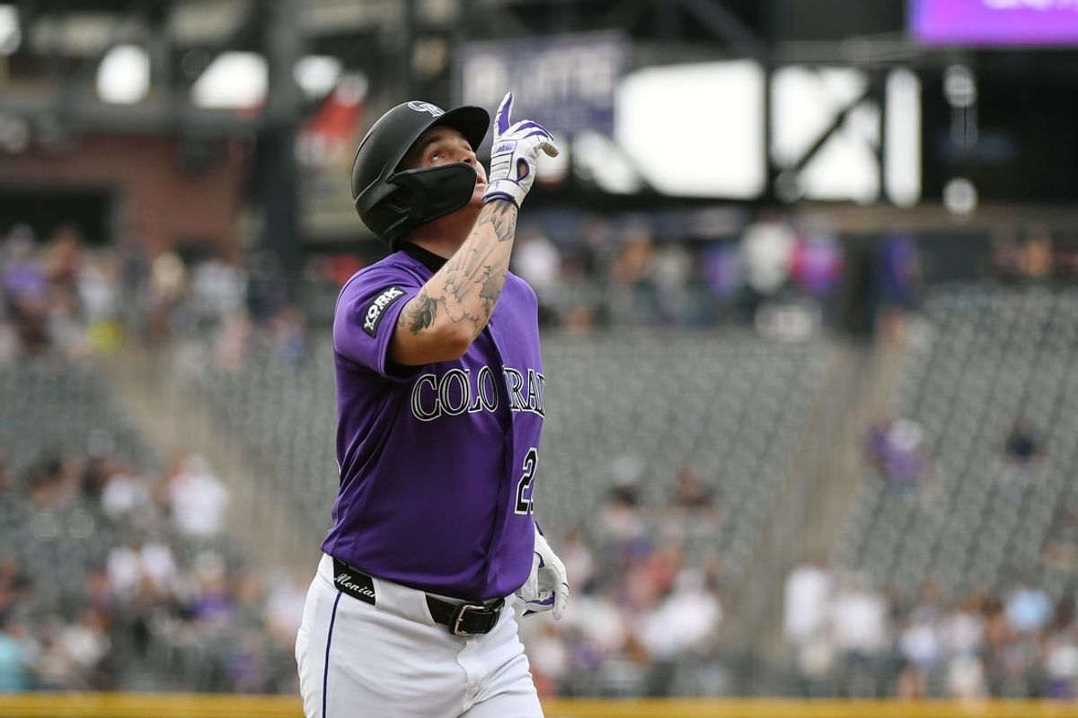 Jul 1, 2026; Denver, Colorado, USA; Colorado Rockies outfielder Mickey Moniak (22) celebrates after a home run in the first inning against the Miami Marlins at Coors Field. Mandatory Credit: Christopher Hanewinckel-Imagn Images