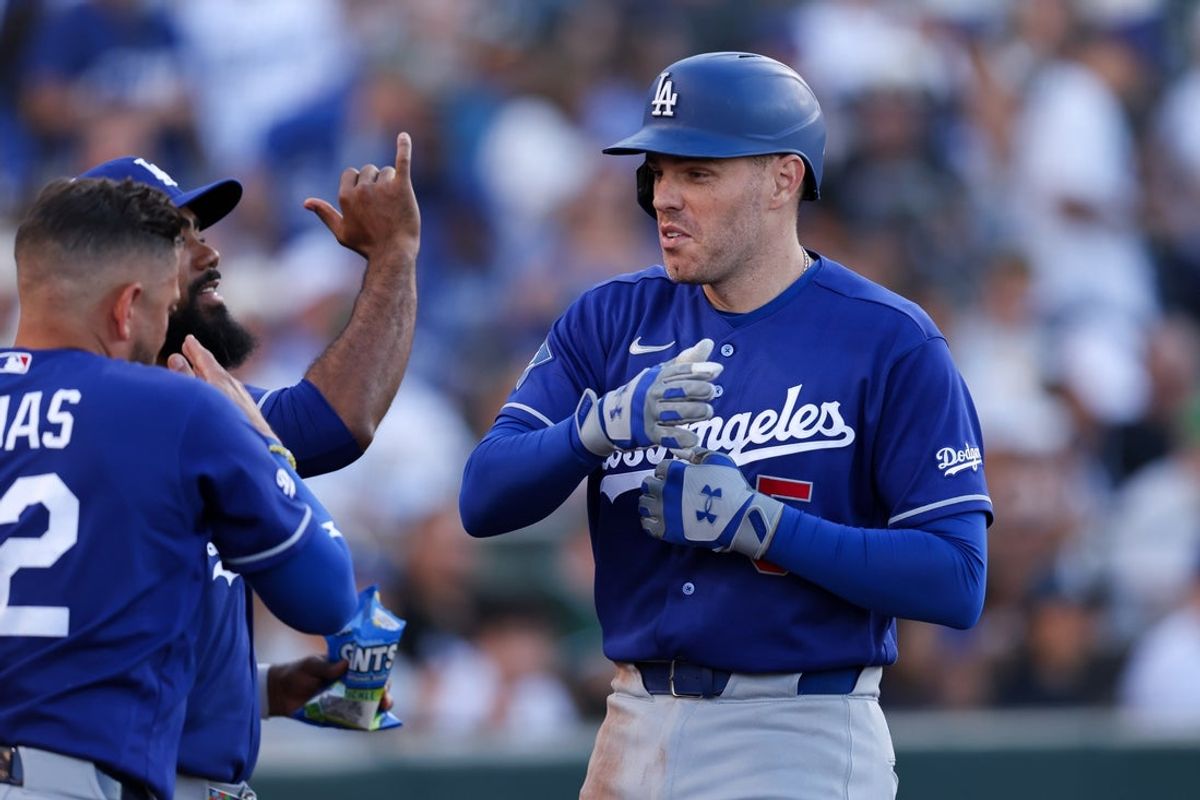 Jul 1, 2026; West Sacramento, California, USA; Los Angeles Dodgers first baseman Freddie Freeman (5) is greeted by left fielder Teoscar Hernández (37) )after hitting a one run home run during the third inning against the Athletics at Sutter Health Park. Mandatory Credit: Sergio Estrada-Imagn Images
