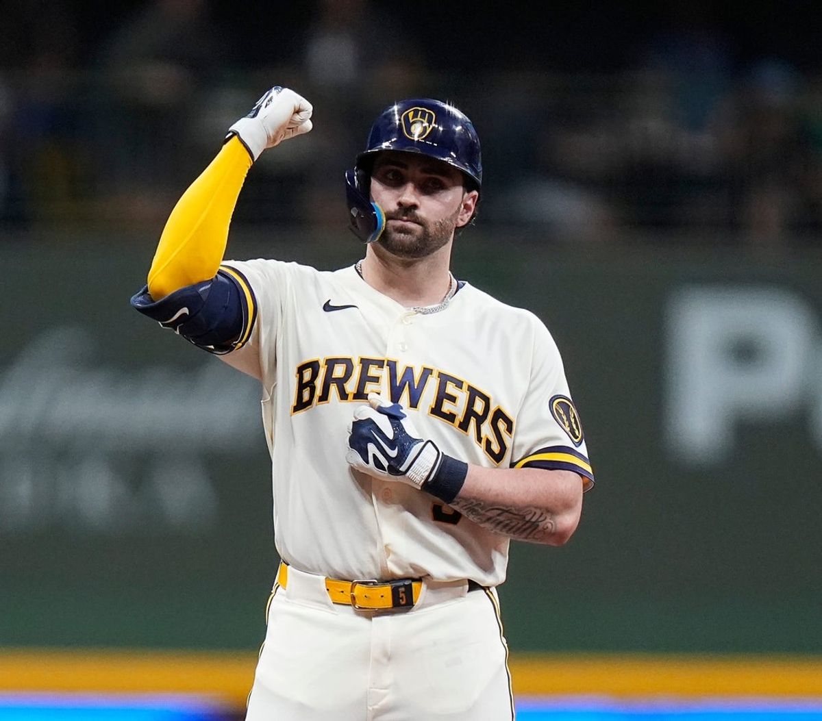 Milwaukee Brewers center fielder Garrett Mitchell (5) doubles (16) on a sharp line drive to Cincinnati Reds center fielder Matt McLain (9) during the fifth inning of the game at American Family Field in Milwaukee, Wisconsin on July 1, 2026.