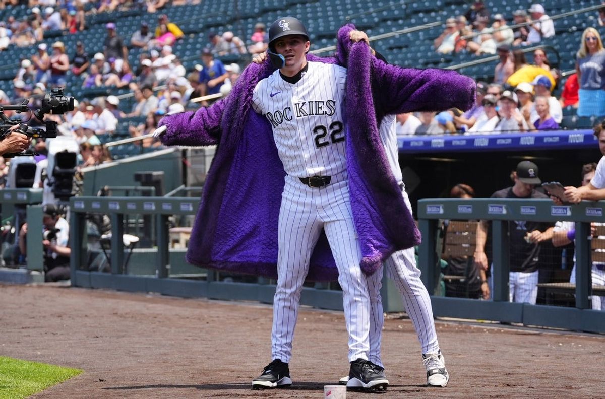 Jul 2, 2026; Denver, Colorado, USA; Colorado Rockies left fielder Mickey Moniak (22) following his solo home run in the first inning against the Miami Marlins at Coors Field. Mandatory Credit: Ron Chenoy-Imagn Images