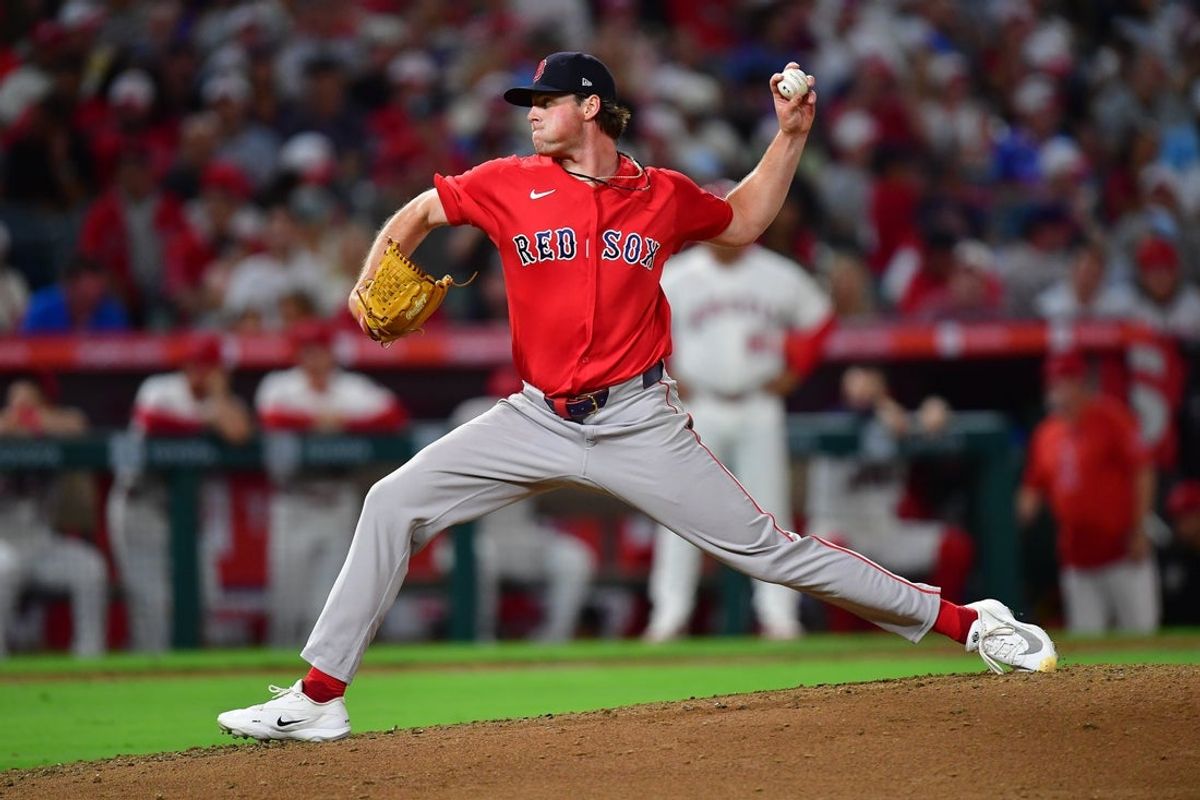 Jul 3, 2026; Anaheim, California, USA; Boston Red Sox pitcher Jake Bennett (64) throws against the Los Angeles Angels during the seventh inning at Angel Stadium. Mandatory Credit: Gary A. Vasquez-Imagn Images