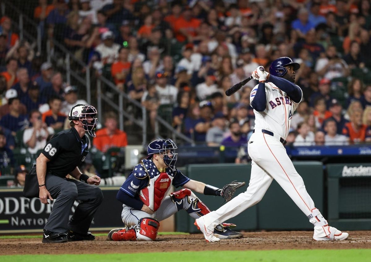 Jul 4, 2026; Houston, Texas, USA;  Houston Astros designated hitter Yordan Alvarez (44) hits a two-run game-winning home run against the Tampa Bay Rays in the ninth inning at Daikin Park. Mandatory Credit: Thomas Shea-Imagn Images