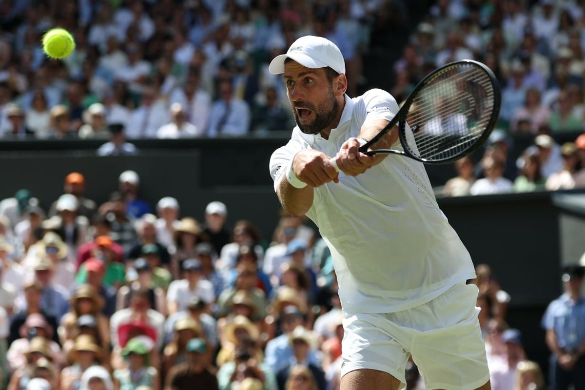 Jul 5, 2026; London, United Kingdom; Novak Djokovic (SRB) hits a backhand against Roman Safiullin (not pictured) on day seven of The Championships Wimbledon 2026 at All England Lawn Tennis and Croquet Club. Mandatory Credit: Geoff Burke-Imagn Images