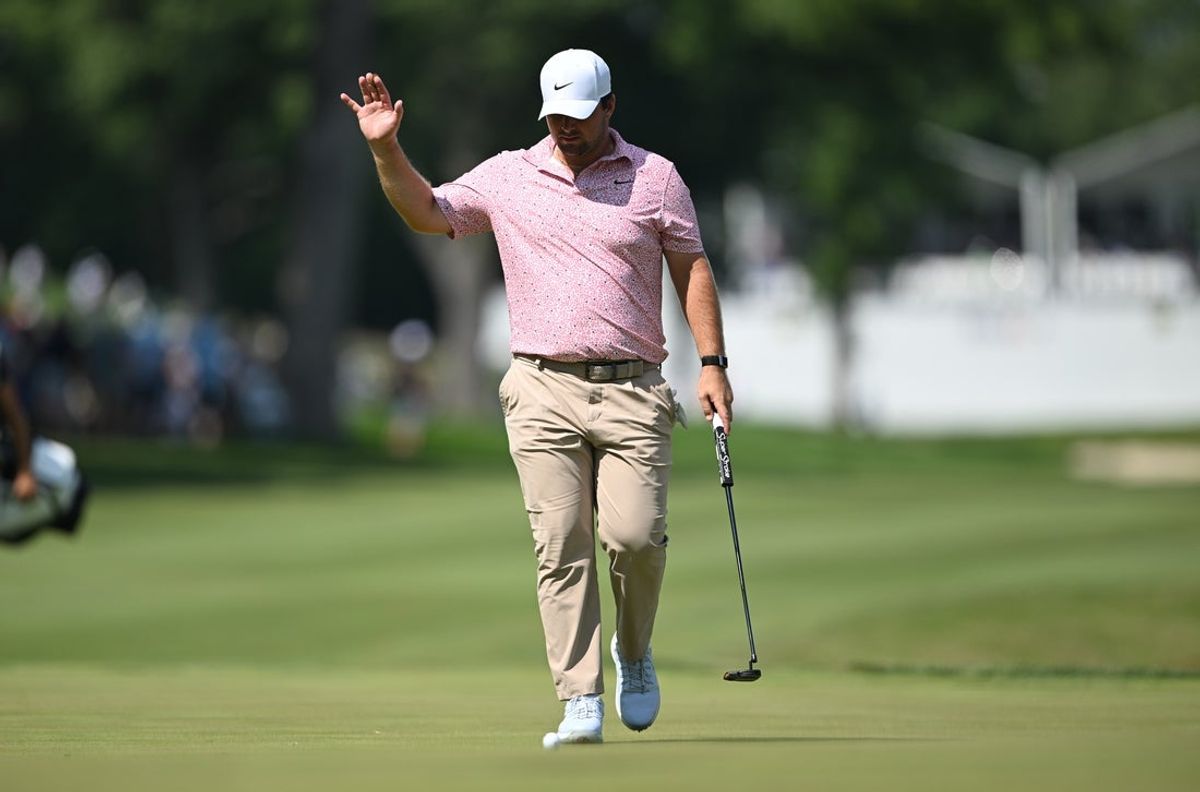 Jul 5, 2026; Silvis, Illinois, USA; Chris Gotterup walks up to his ball on the 18th green during the final round of the John Deere Classic golf tournament. Mandatory Credit: Marc Lebryk-Imagn Images