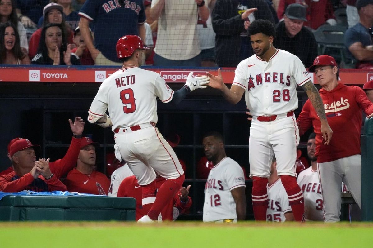 Jul 5, 2026; Anaheim, California, USA; Los Angeles Angels shortstop Zach Neto (9) is congratulated by center fielder Jose Siri (28) after hitting a home run in the ninth inning against the Boston Red Sox at Angel Stadium. Mandatory Credit: Kirby Lee-Imagn Images