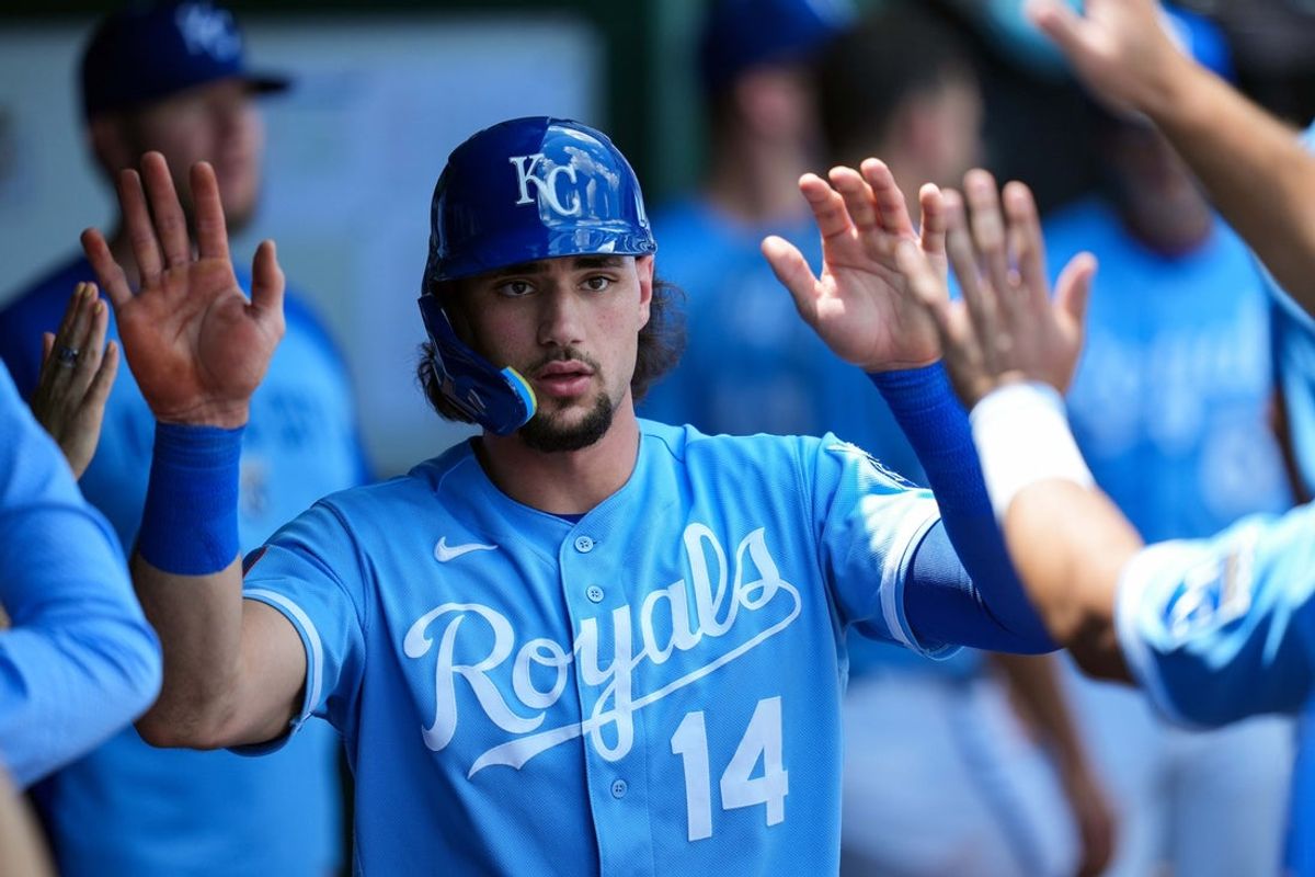 Jul 6, 2026; Kansas City, Missouri, USA; Kansas City Royals right fielder Jac Caglianone (14) is congratulated by teammates after scoring a run during the first inning against the Philadelphia Phillies at Kauffman Stadium. Mandatory Credit: Jay Biggerstaff-Imagn Images